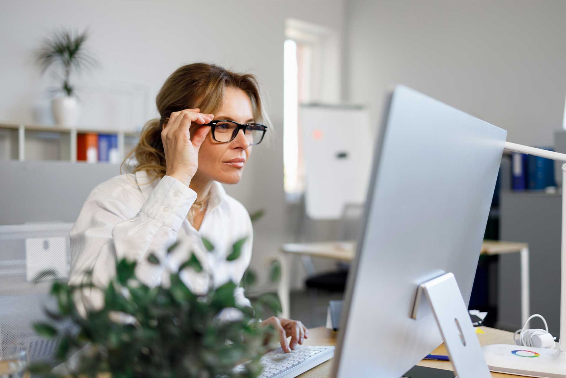 woman looking at computer